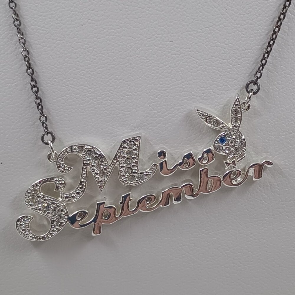 Extremely Rare Playboy Silver Plated Miss September Bunny Pendant.